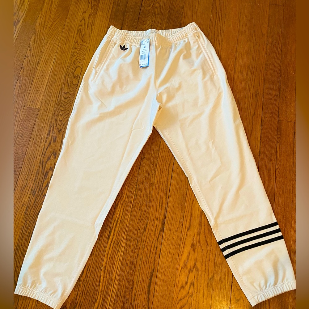 Adidas Mens Medium Activewear pants. Cream/tan with black and white stripes.